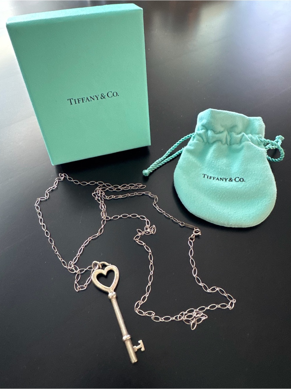 Tiffany & Co. Silver Heart Key Pendant Necklace with Signature Blue Pouch